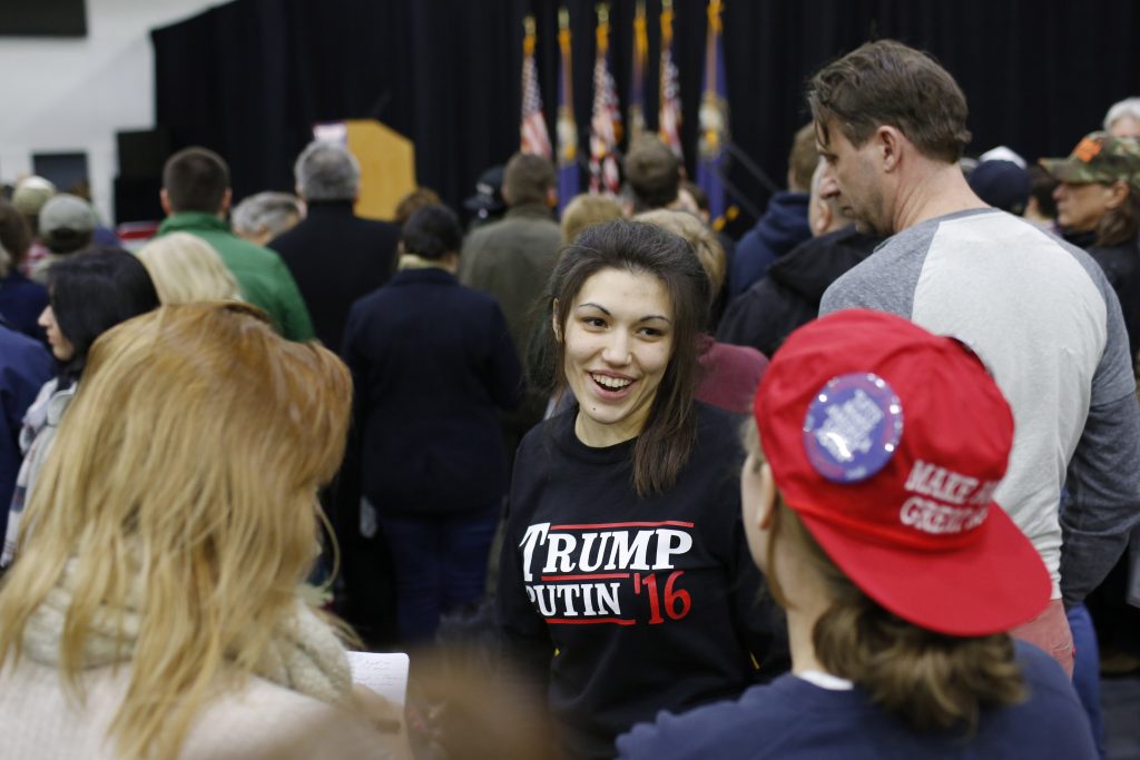A woman wears a shirt reading "Trump-Putin '16" before a rally for Republican presidential candidate Donald Trump at Plymouth State University, February 7, 2016, in Plymouth, New Hampshire. DOMINICK REUTER/AFP/Getty Images